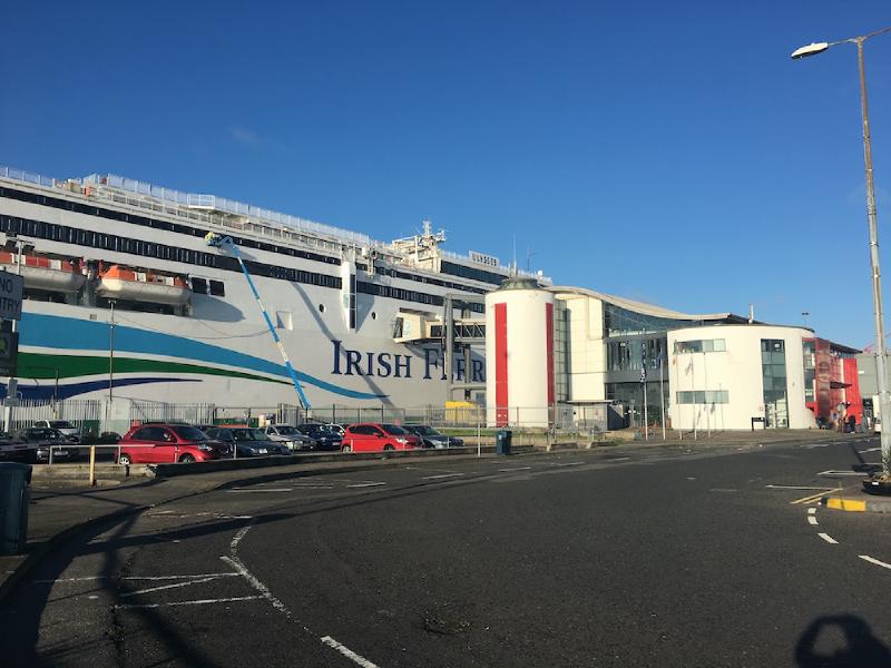 The Irish Ferries ship Ulysses docked beside the terminal building at Dublin Port under a clear blue sky